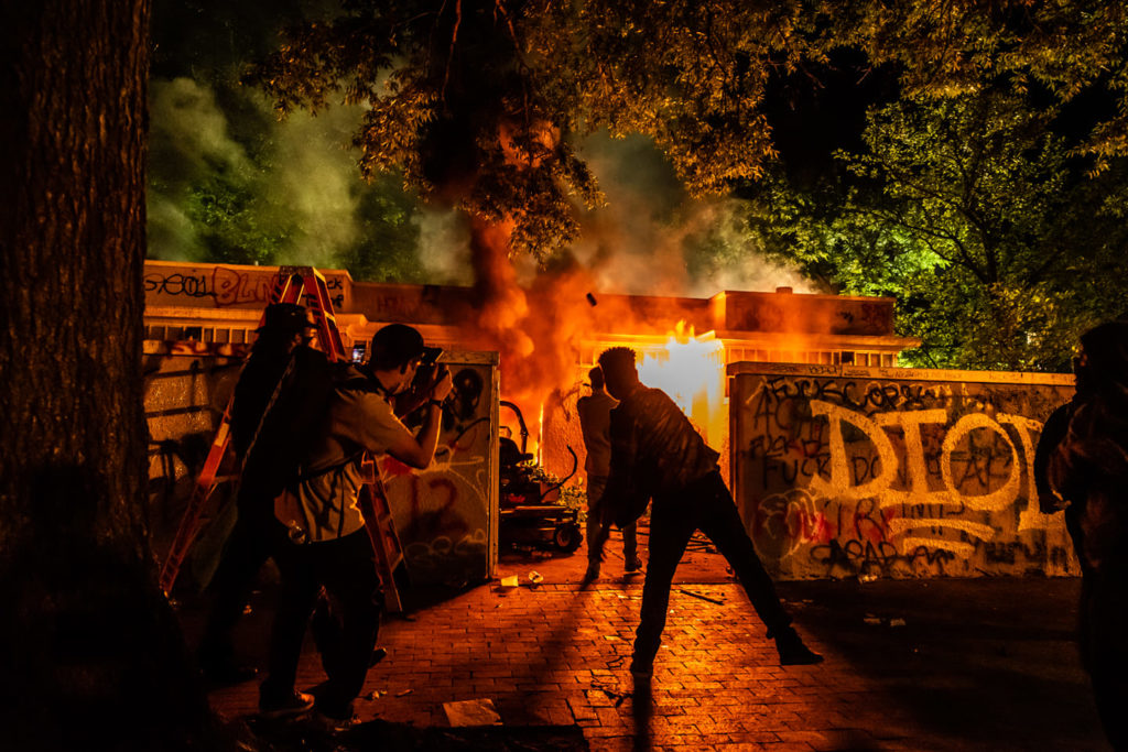 DC burning building during protest by Drone U Member Ben Burgess